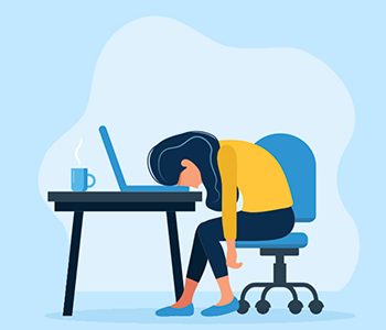 student falling asleep at laptop