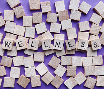 picture of Scrabble tiles spelling the word wellness